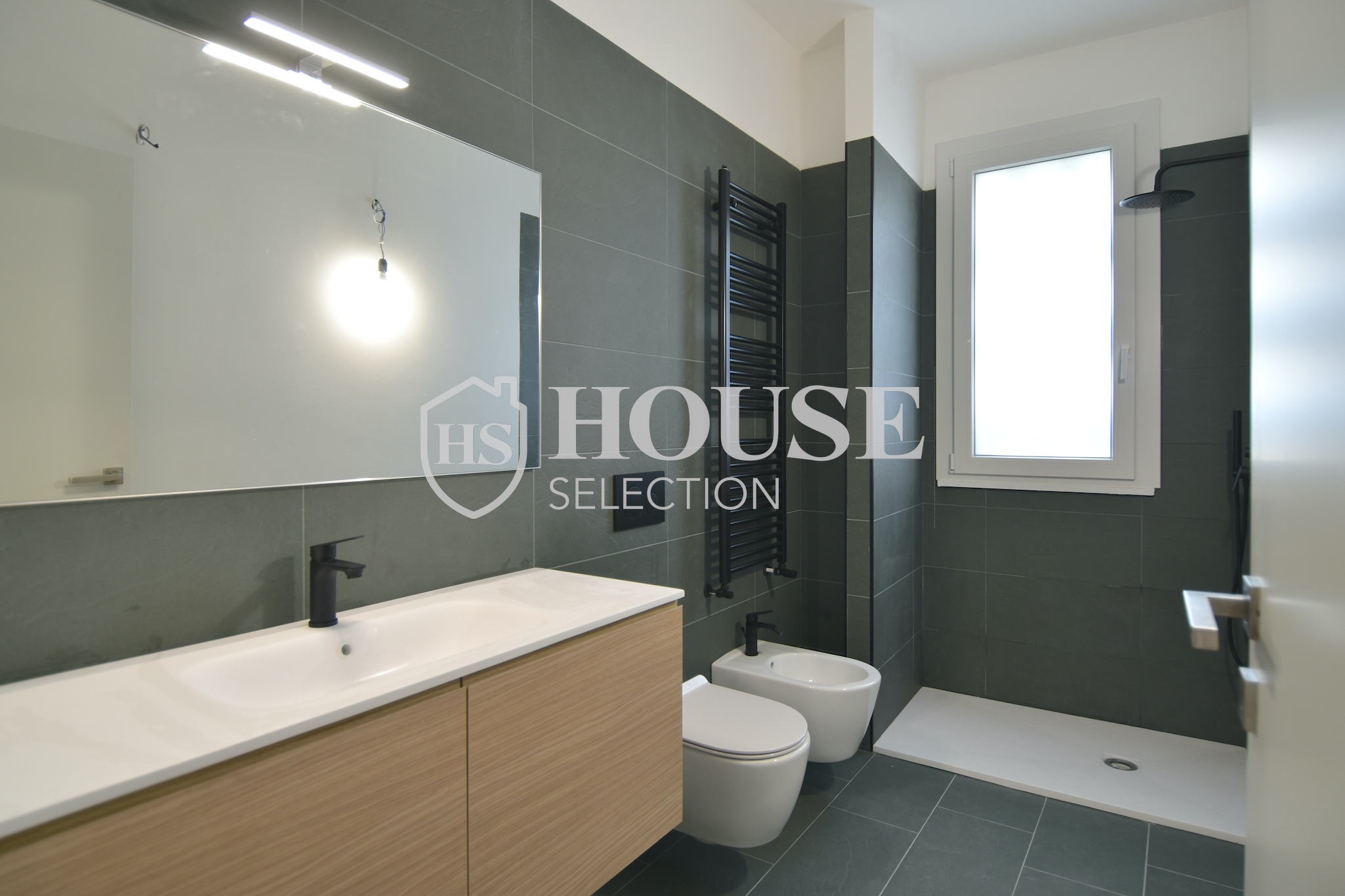 Vendita trilocale via Redaelli, nuova realizzazione, piano alto, giardino, Milano 14